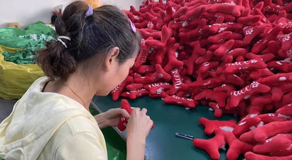 Stuffing and assembly of plush toys on production line